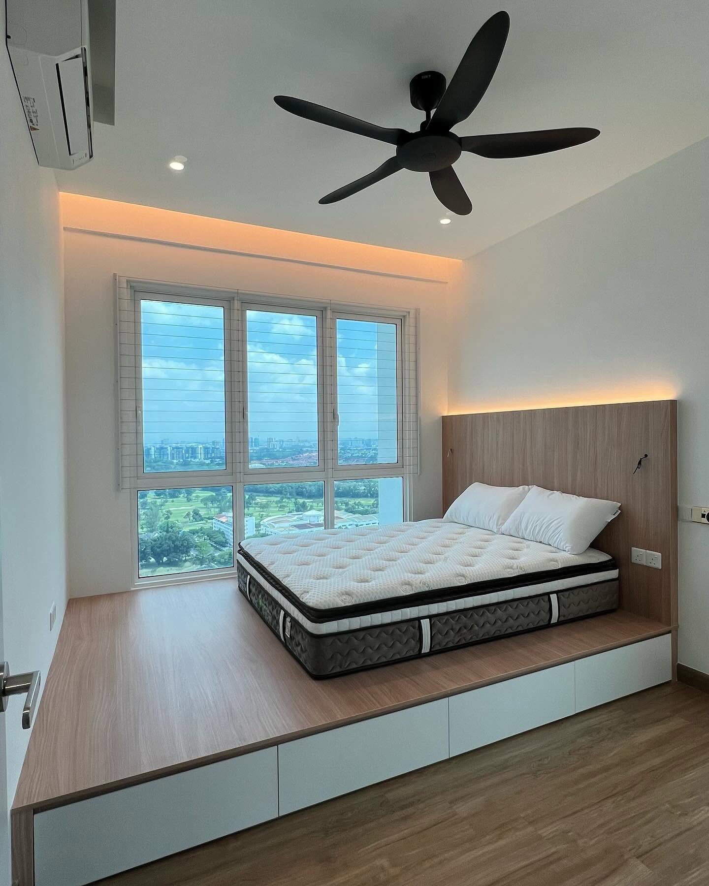 Bedroom with built-in platform bed, storage drawers and timber headboard
